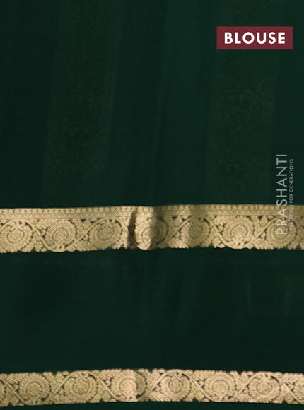 Pure mysore silk saree bottle green with allover zari woven buttas and rettapet zari woven border