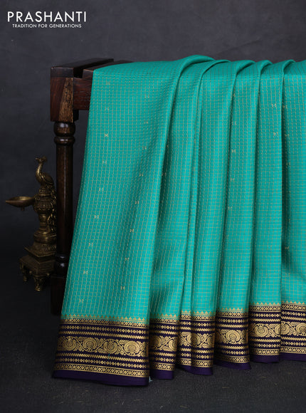 Pure mysore silk saree teal green and navy blue with allover small zari checks & buttas and zari woven border