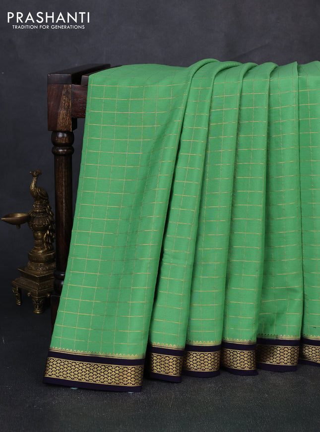 Pure mysore silk saree pastel green and navy blue with allover zari checked pattern and zari woven border