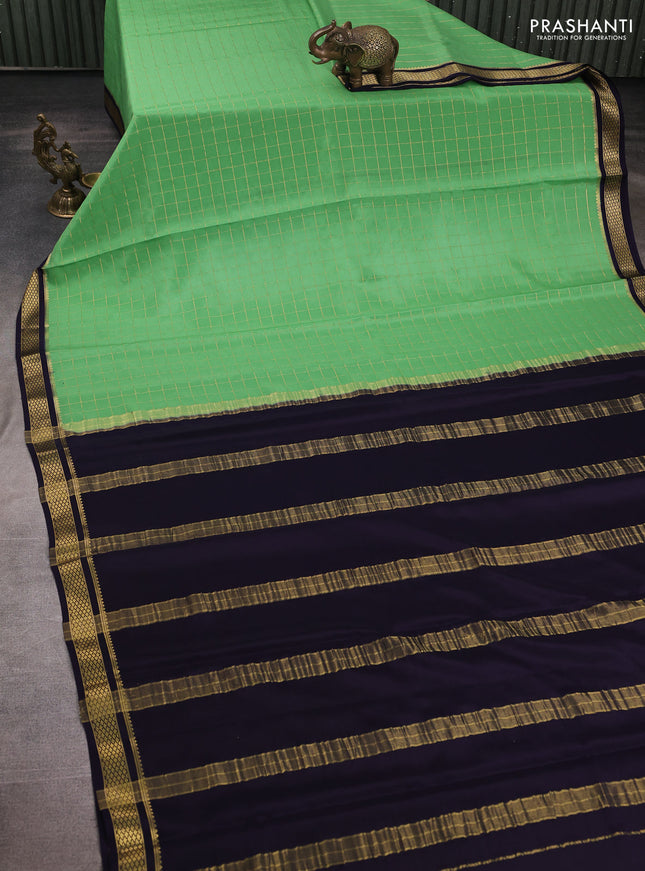 Pure mysore silk saree pastel green and navy blue with allover zari checked pattern and zari woven border