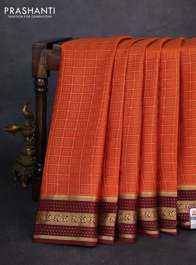 Pure mysore silk saree rust shade and coffee brown with allover small zari checked pattern and zari woven border
