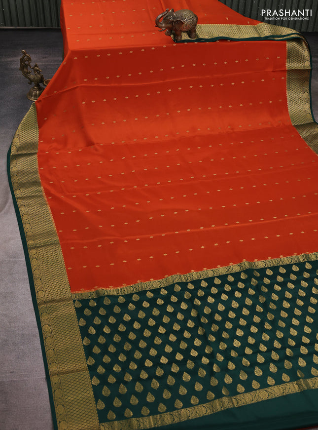 Pure mysore silk saree rust shade and green with allover zari woven buttas and zari woven border