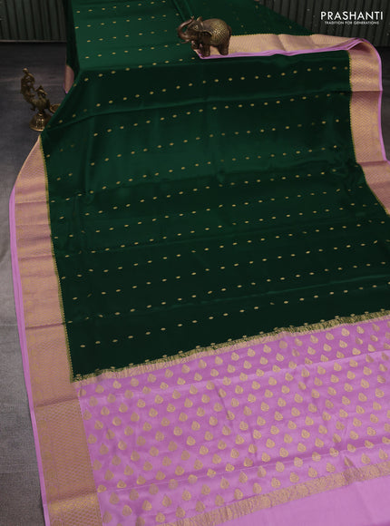 Pure mysore silk saree bottle green and lotus pink with allover zari woven buttas and zari woven border