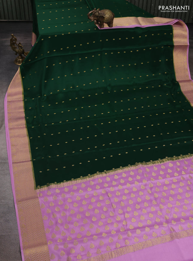 Pure mysore silk saree bottle green and lotus pink with allover zari woven buttas and zari woven border