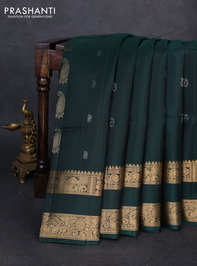 Pure soft silk saree bottle green with allover zari woven paisley buttas and rettapet zari woven border