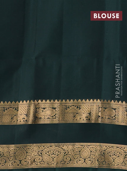 Pure soft silk saree bottle green with allover zari woven paisley buttas and rettapet zari woven border