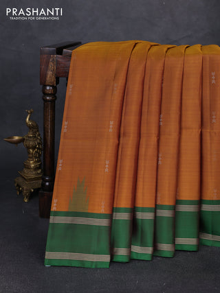 Pure soft silk saree dark mustard and green with zari woven buttas and rettapet zari woven border