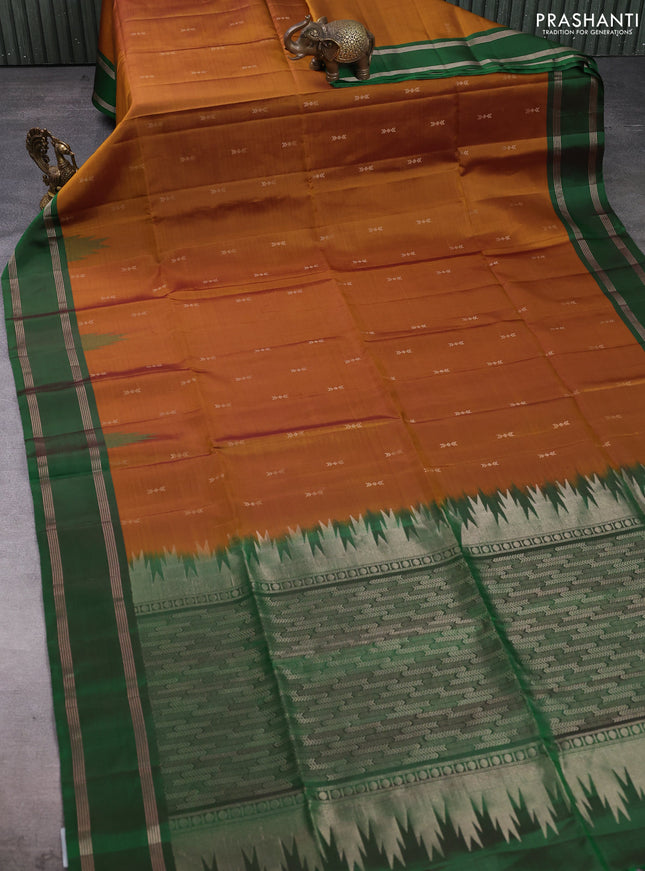 Pure soft silk saree dark mustard and green with zari woven buttas and rettapet zari woven border