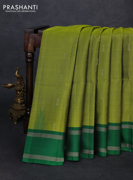 Pure soft silk saree mehendi green and green with zari woven buttas and rettapet zari woven border