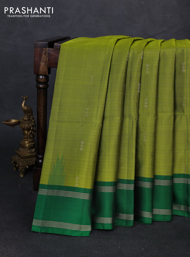 Pure soft silk saree mehendi green and green with zari woven buttas and rettapet zari woven border