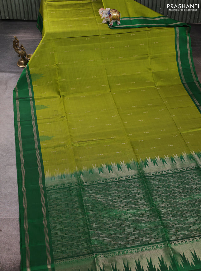 Pure soft silk saree mehendi green and green with zari woven buttas and rettapet zari woven border