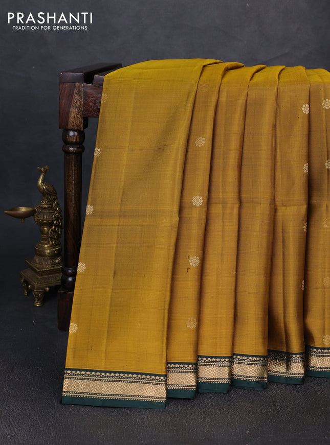 Pure soft silk saree dark mustard and bottle green with allover zari woven buttas and zari woven border
