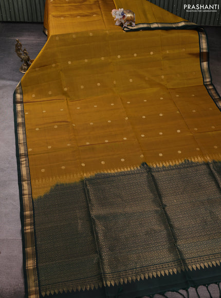 Pure soft silk saree dark mustard and bottle green with allover zari woven buttas and zari woven border