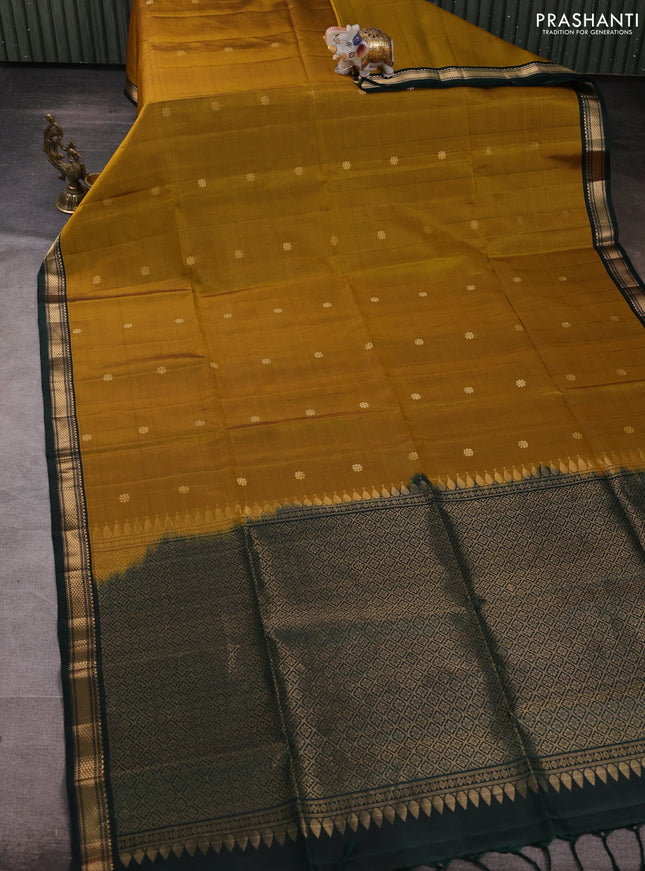 Pure soft silk saree dark mustard and bottle green with allover zari woven buttas and zari woven border