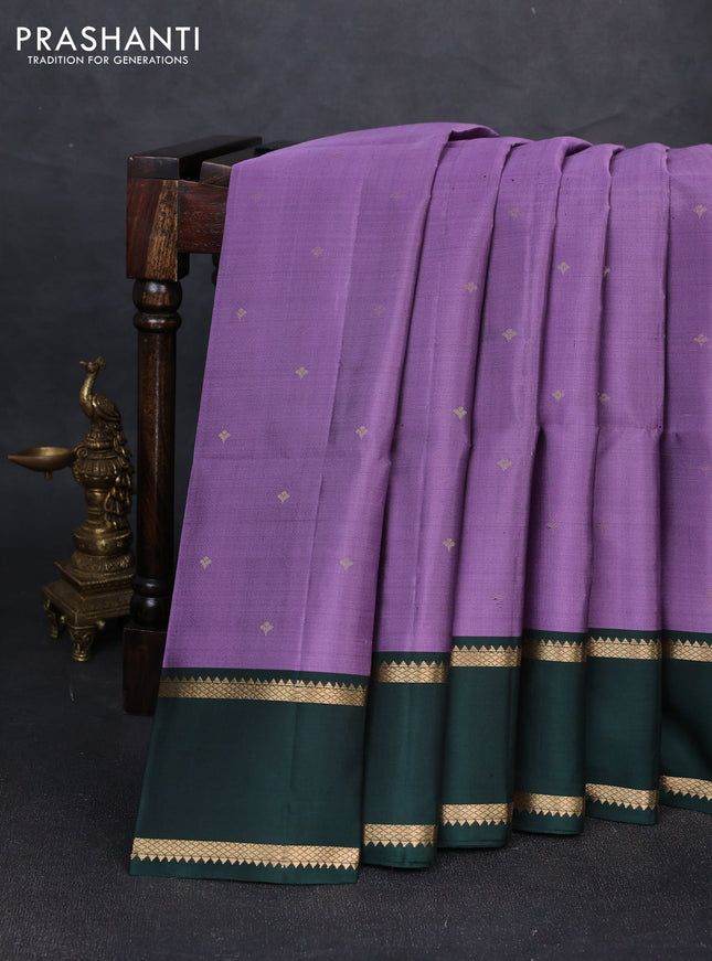 Pure soft silk saree lavender and bottle green with allover zari woven buttas and zari woven border