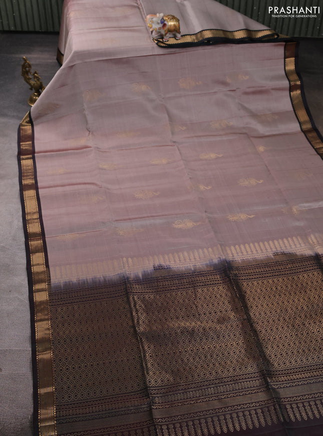 Pure soft silk saree grey shade and dual shade of bottle green with zari woven buttas and zari woven border