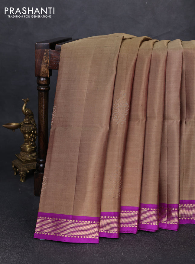 Pure soft silk saree chikku shade and purple with zari woven buttas and zari woven border