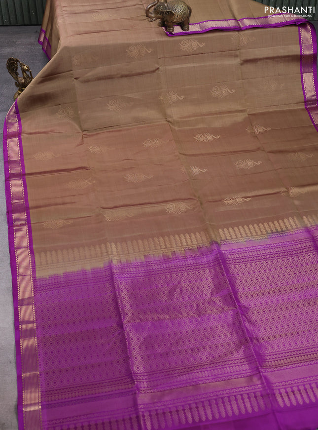 Pure soft silk saree chikku shade and purple with zari woven buttas and zari woven border