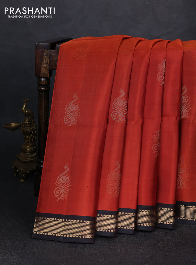 Pure soft silk saree rustic orange and dual shade of peacock green with zari woven buttas and zari woven border