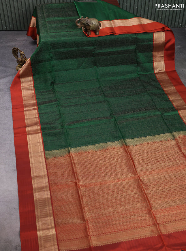 Pure soft silk saree bottle green and rustic orange with allover self emboss & zari weaves and zari woven simple border