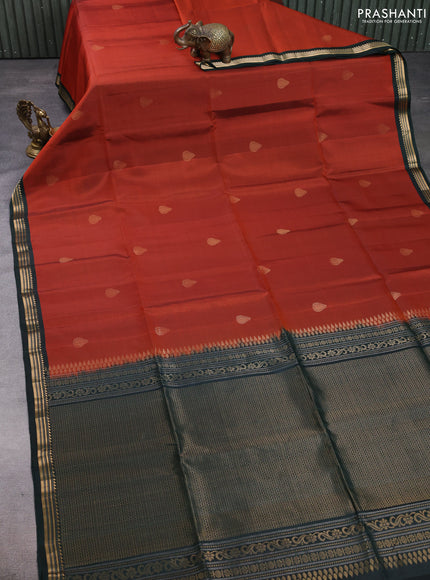 Pure soft silk saree rust shade and bottle green with zari woven buttas and zari woven border