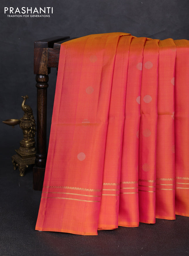 Pure soft silk saree dual shade of pinksh orange with allover rudhraksha zari woven buttas and zari woven simple border