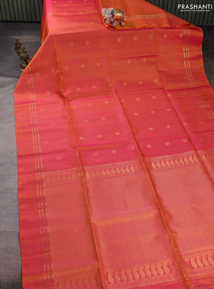 Pure soft silk saree dual shade of pinksh orange with allover rudhraksha zari woven buttas and zari woven simple border