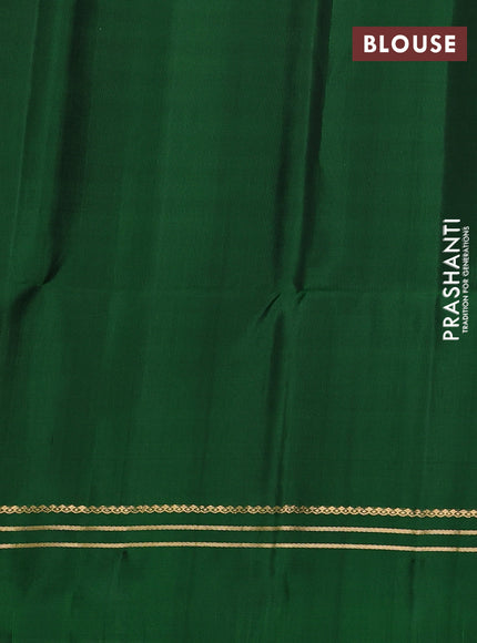 Pure soft silk saree green with allover rudhraksha zari woven buttas and zari woven simple border