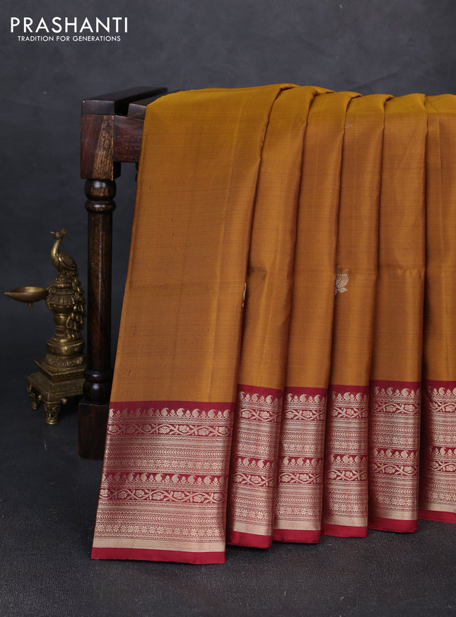 Pure soft silk saree dark mustard and marion with zari woven floral buttas and zari woven border