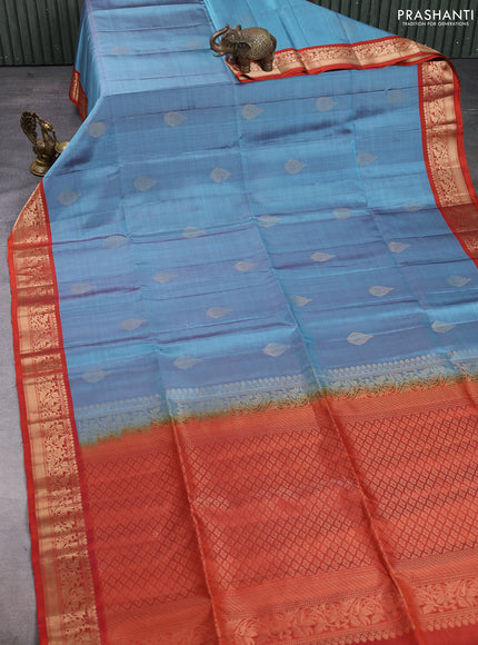 Pure soft silk saree pastel blue and rustic orange with zari woven buttas and rich zari woven border
