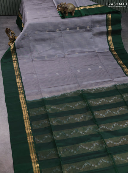 Pure soft silk saree grey and bottle green with allover zari weaves & buttas and zari woven simple border