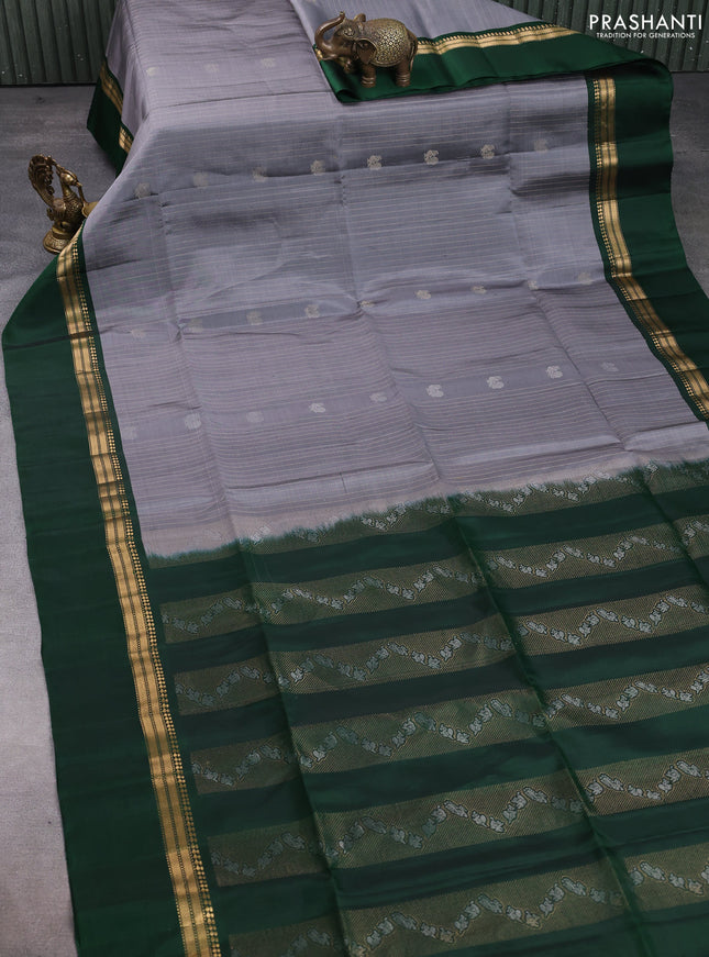 Pure soft silk saree grey and bottle green with allover zari weaves & buttas and zari woven simple border