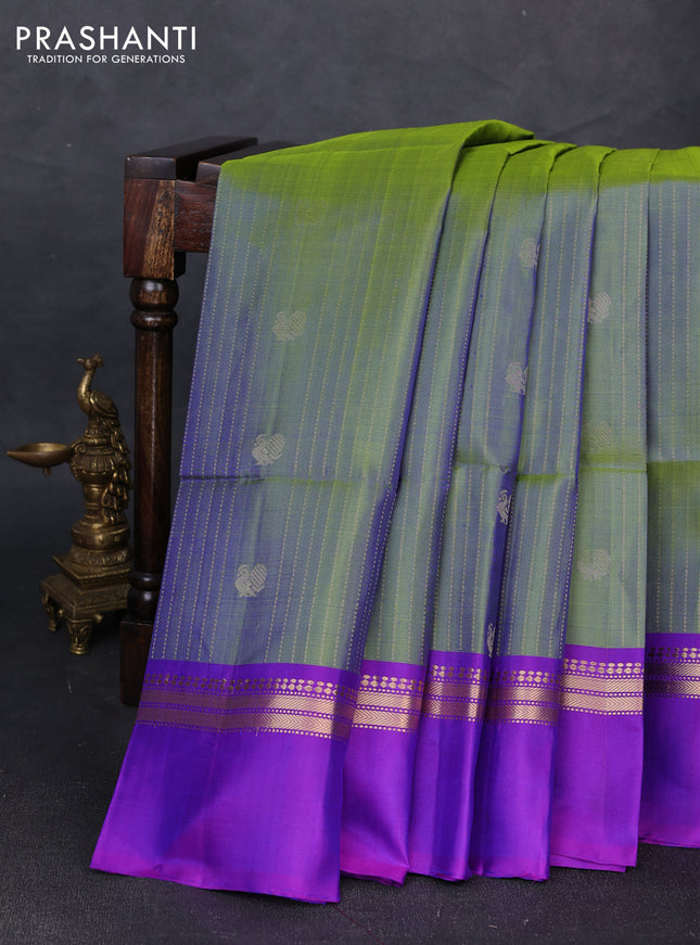 Pure soft silk saree dual shade of green and purple with allover zari weaves & buttas and zari woven simple border