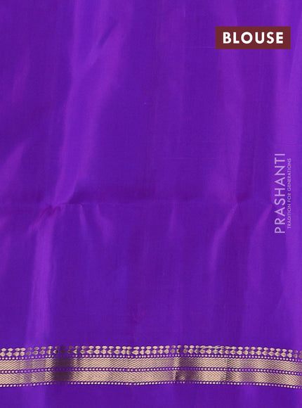 Pure soft silk saree dual shade of green and purple with allover zari weaves & buttas and zari woven simple border