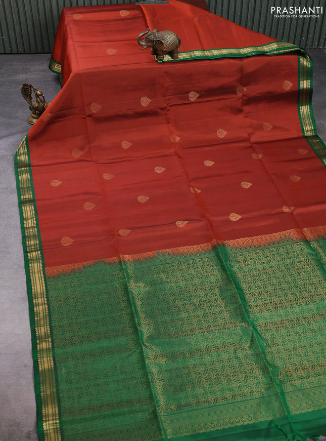 Pure soft silk saree rustic orange and green with zari woven buttas and zari woven border
