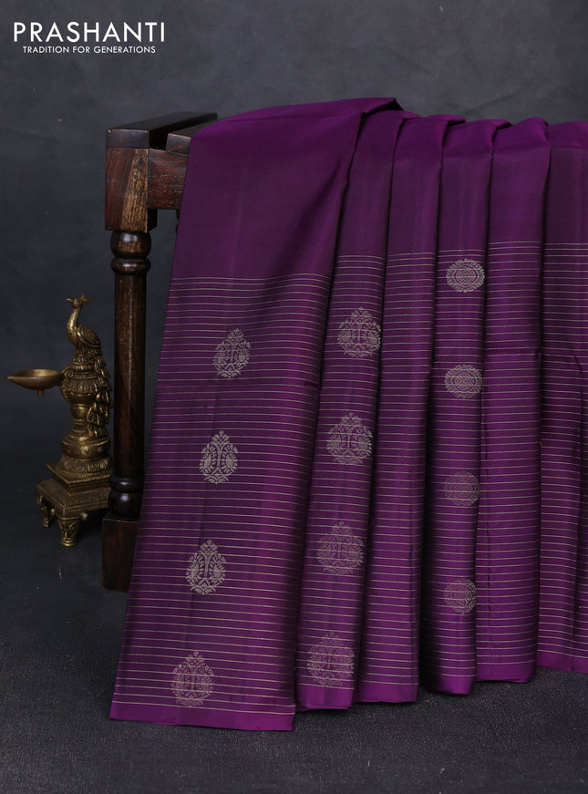 Pure soft silk saree purple with plain body and long zari stripe butta border