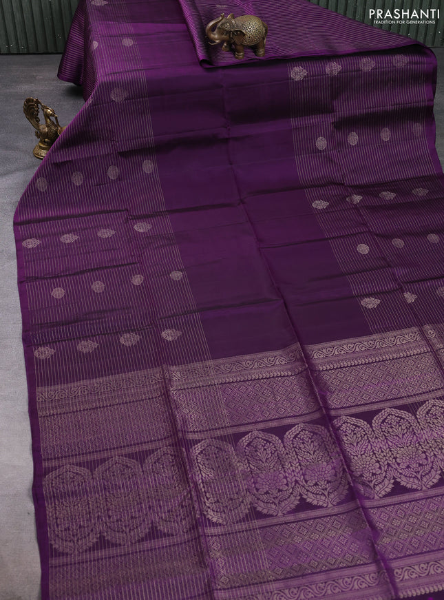 Pure soft silk saree purple with plain body and long zari stripe butta border