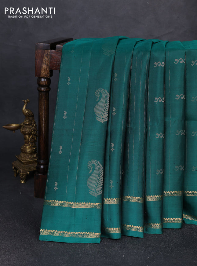 Pure soft silk saree teal green with allover zari weaves & buttas and rettapet zari woven border