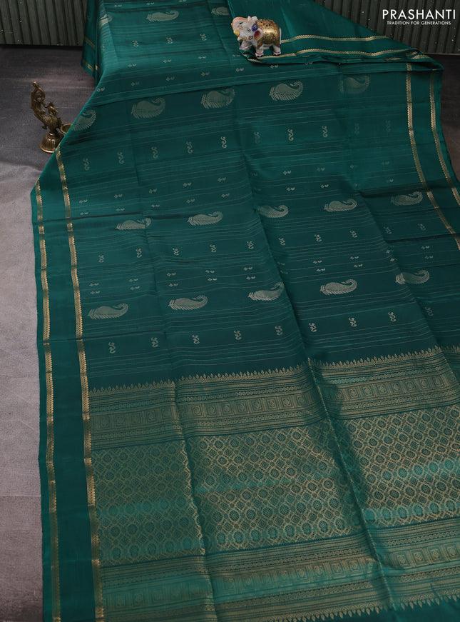 Pure soft silk saree teal green with allover zari weaves & buttas and rettapet zari woven border