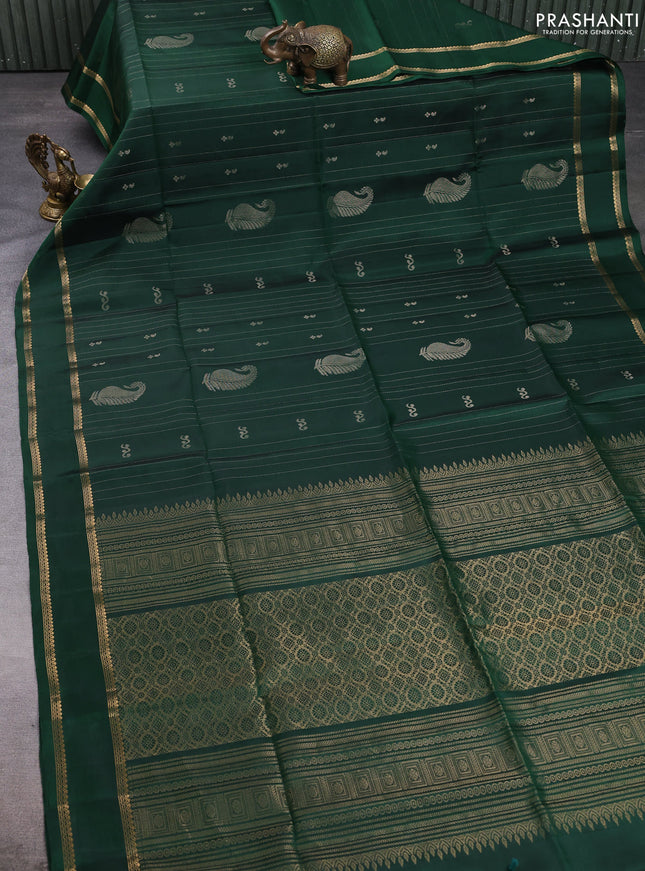 Pure soft silk saree bottle green with allover zari weaves & buttas and rettapet zari woven border