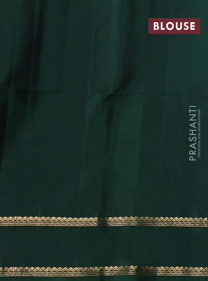 Pure soft silk saree bottle green with allover zari weaves & buttas and rettapet zari woven border