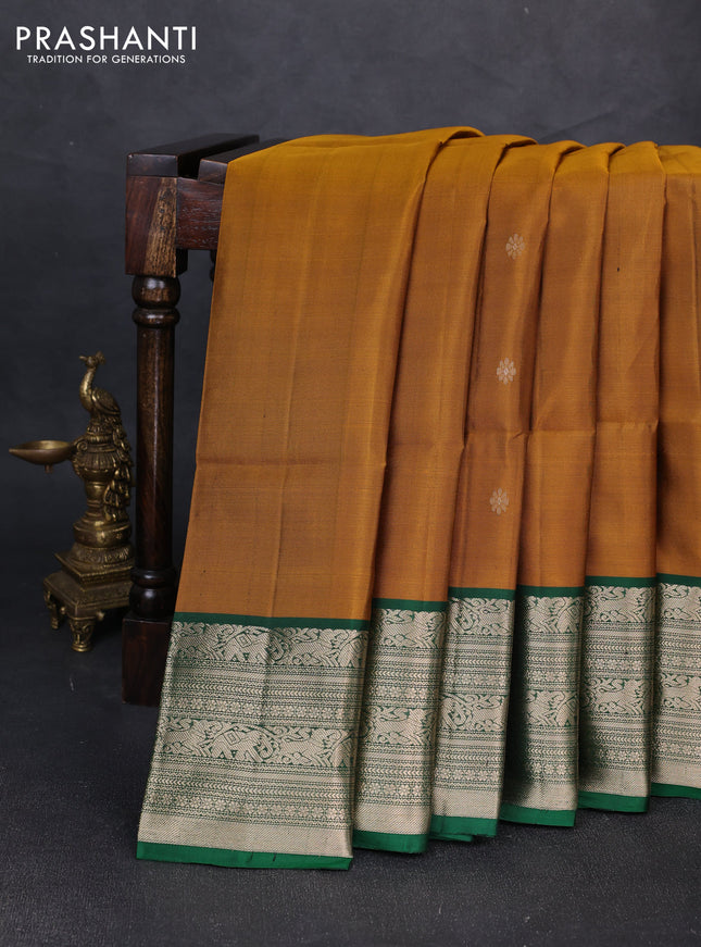 Pure soft silk saree dark mustard and bottle green with zari woven buttas and zari woven border