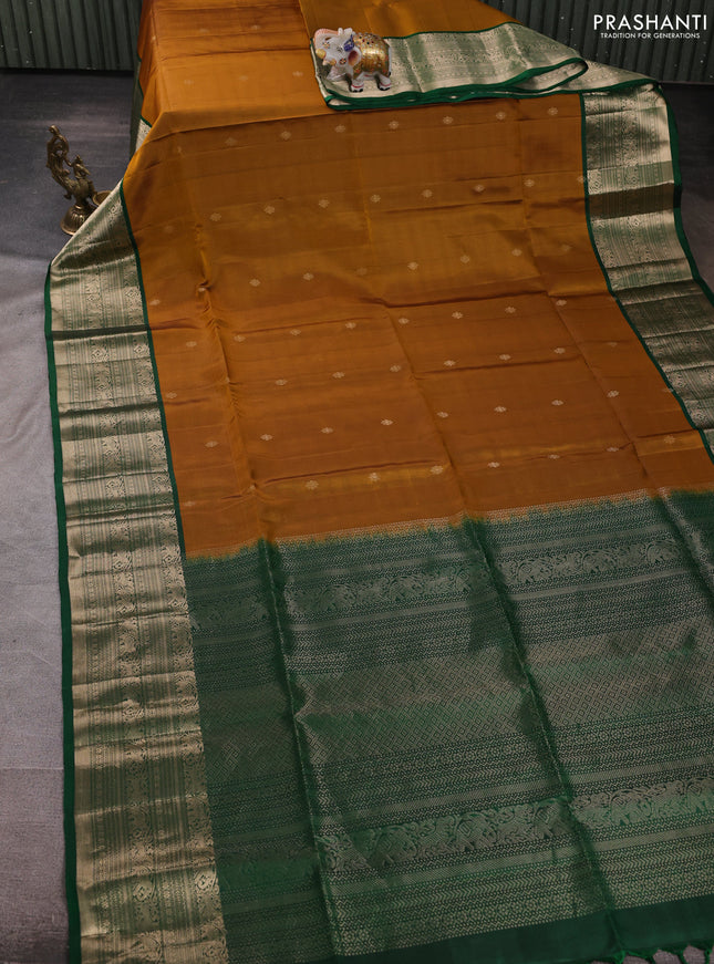 Pure soft silk saree dark mustard and bottle green with zari woven buttas and zari woven border