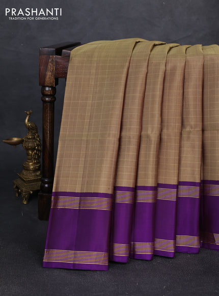 Pure soft silk saree elaichi green and violet with allover zari checked pattern and rettapet zari woven border
