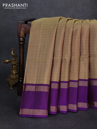 Pure soft silk saree elaichi green and violet with allover zari checked pattern and rettapet zari woven border