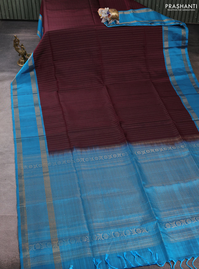 Pure soft silk saree deep wine and cs blue with allover zari stripe pattern and rettapet zari woven border