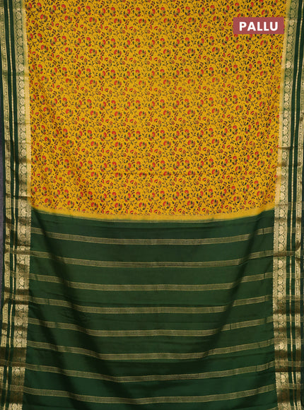 Semi mysore silk saree yellow and green with allover prints and zari woven border