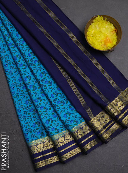 Semi mysore silk saree teal blue and navy blue with allover prints and zari woven border