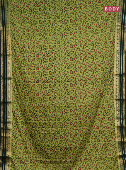 Semi mysore silk saree lime green and green with allover prints and zari woven border