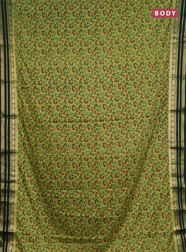 Semi mysore silk saree lime green and green with allover prints and zari woven border